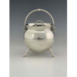 After Christopher dresser, a George V silver cauldron