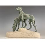 Jules Edmond Masson, a patinated art metal figure group of two hounds