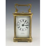 A 19th century brass repeater carriage timepiece, Hunt & Roskell, striking on the hour and half,