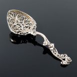 A Victorian cast and reticulated silver spoon