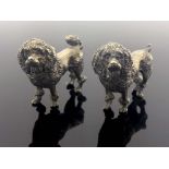 A pair of Edwardian novelty silver dog salt and pepper pots, William Edward Hurcomb, London 1907