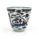 A Japanese Imari beaker cup, late 17th or early 18th century, ogee form, underglaze blue
