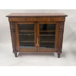 A William IV mahogany low library bookcase, circa 1830, crossbanded top with gadroon carved