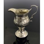 A George III silver cream jug, Thomas Evans and George Smith, London 1770