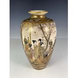 A Japanese satsuma ware baluster vase, Meiji period, 1868-1912, painted with panels of figures at