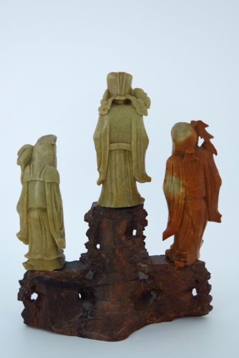 A Chinese soapstone carving, in the form of five robed figures mounted upon a rocky outcrop, 34cm - Image 13 of 14