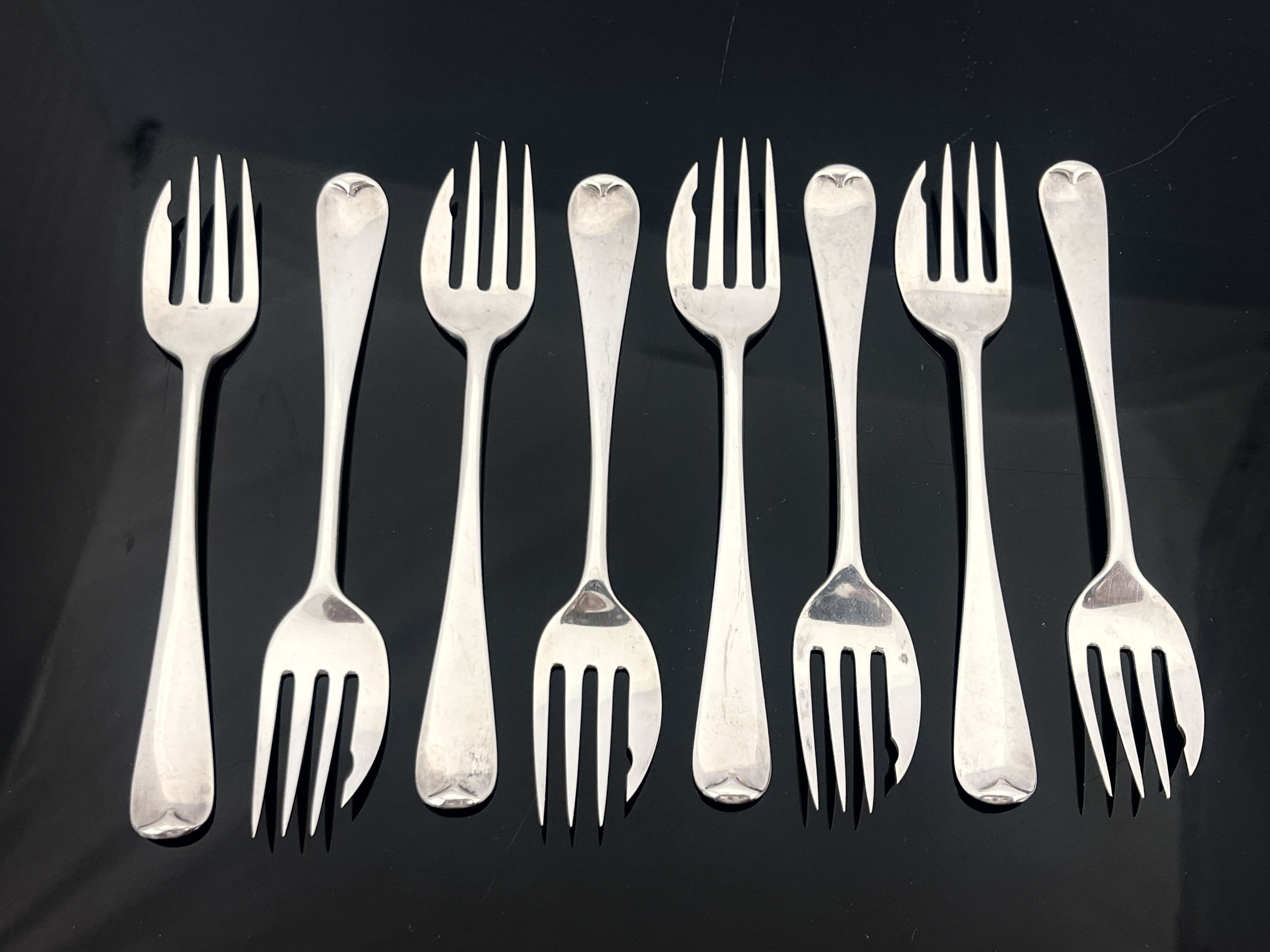 A set of eight George VI silver oyster of cake forks, Walter Wilson Ltd., London 1936, Old English