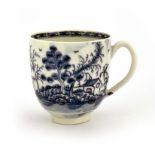 A Worcester blue and white coffee cup