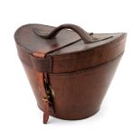 Vintage Luggage, a tan leather hat box, late 19th Century, brass studded loop handle to the bowed