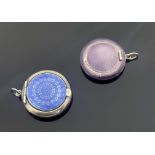 Two silver and enamelled pendant compacts, circular form with inset hinged lids and convex