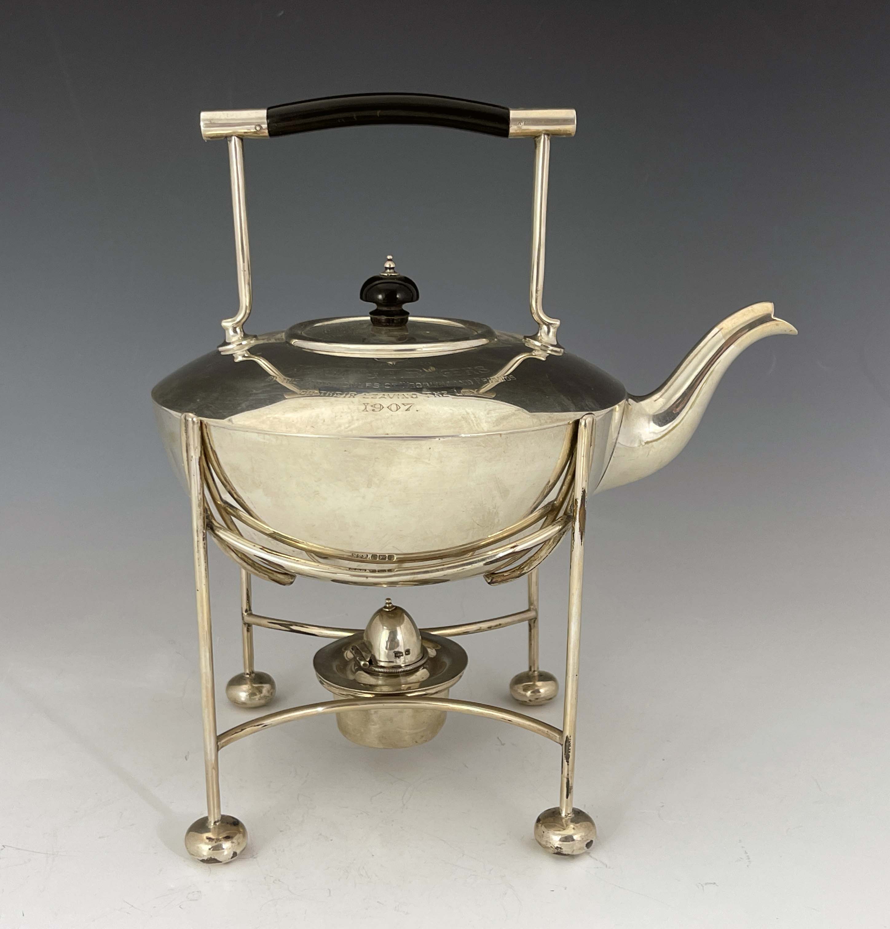 An Arts and Crafts silver kettle and stand, Mappin and Webb, Sheffield 1906