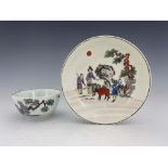 A Worcester polychrome transfer printed tea bowl and saucer,