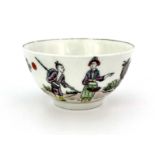 A Worcester black transfer and polychrome tea bowl