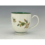 A Worcester gilt and green floral coffee cup, circa 1770, James Giles studio style decoration of