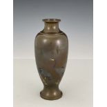A Japanese inlaid bi-metal bronze vase, Meiji period, 1868-1912. of slender baluster form with a