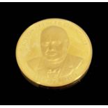 A 22ct gold medal of Sir Winston Churchill, Gregory & Co 1965, obv. bust full-face, rev. V' for