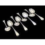 A matched set of eight Victorian and George V silver dessert spoons