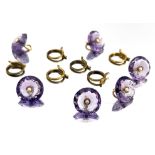 A set of six amethyst, gold and split pearl buttons