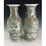 A pair of large Chinese baluster vases, 19th Century, flared openings, gilt zoomorphic twin