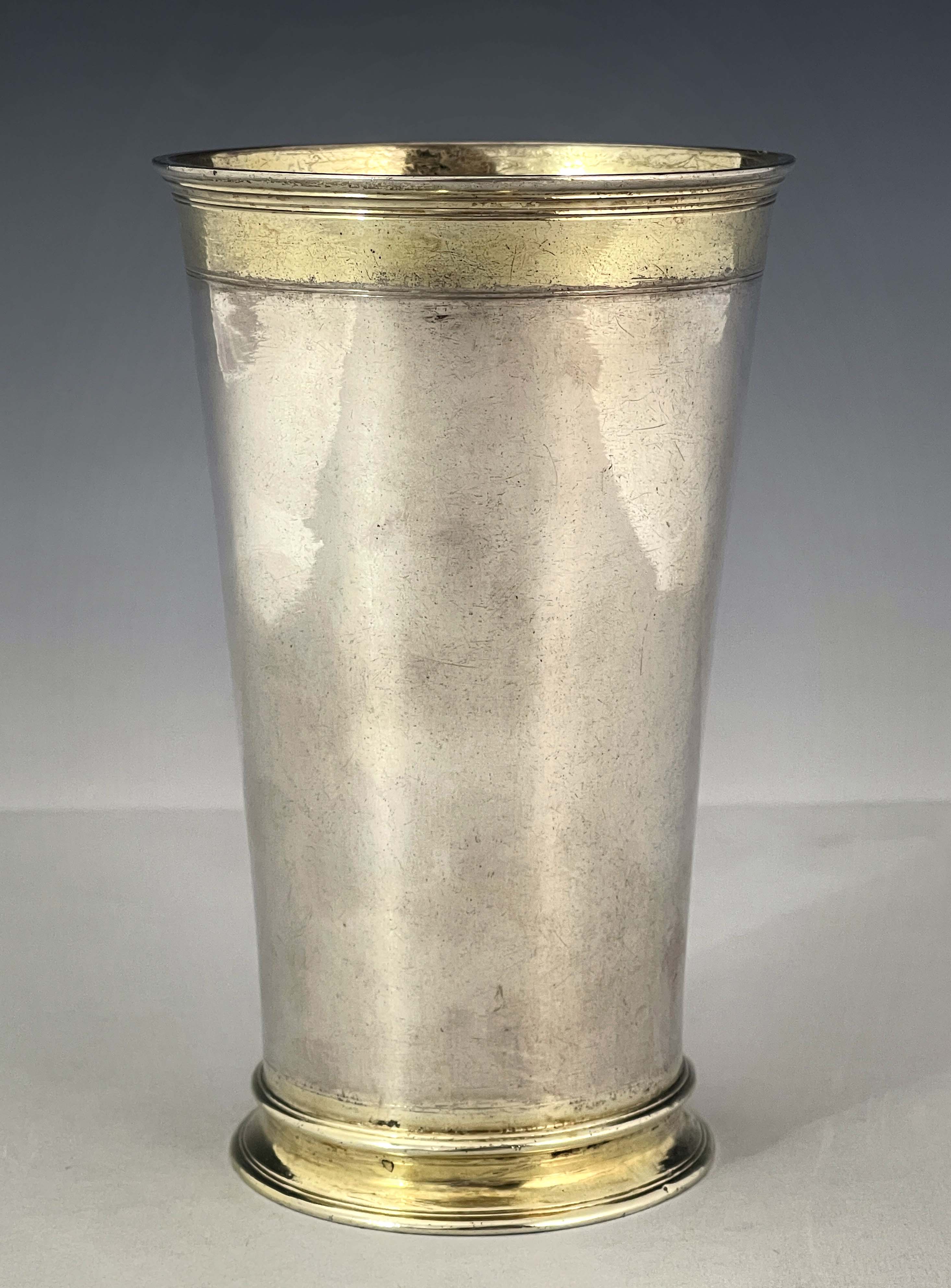 An early 18th century German silver and parcel gilt beaker, WS, Augsburg 1737-39, trumpet form, gilt