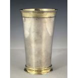 An early 18th century German silver and parcel gilt beaker, WS, Augsburg 1737-39, trumpet form, gilt