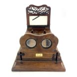 A 19th Century Hudson & Son of Greenwich figured walnut table top stereoscopic viewer, height