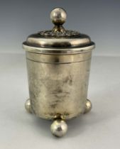A German silver gilt cup and cover, Augsburg circa 1680, beaker form, on three ball feet with ball