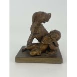 A Victorian bronze figure group, modelled as a dog protecting a child, raised on rectangular wood