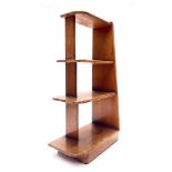A set of Art Deco Czech freestanding shelves, circa 1930, four graduated tiers with curved open