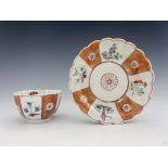 A Worcester polychrome tea bowl and saucer