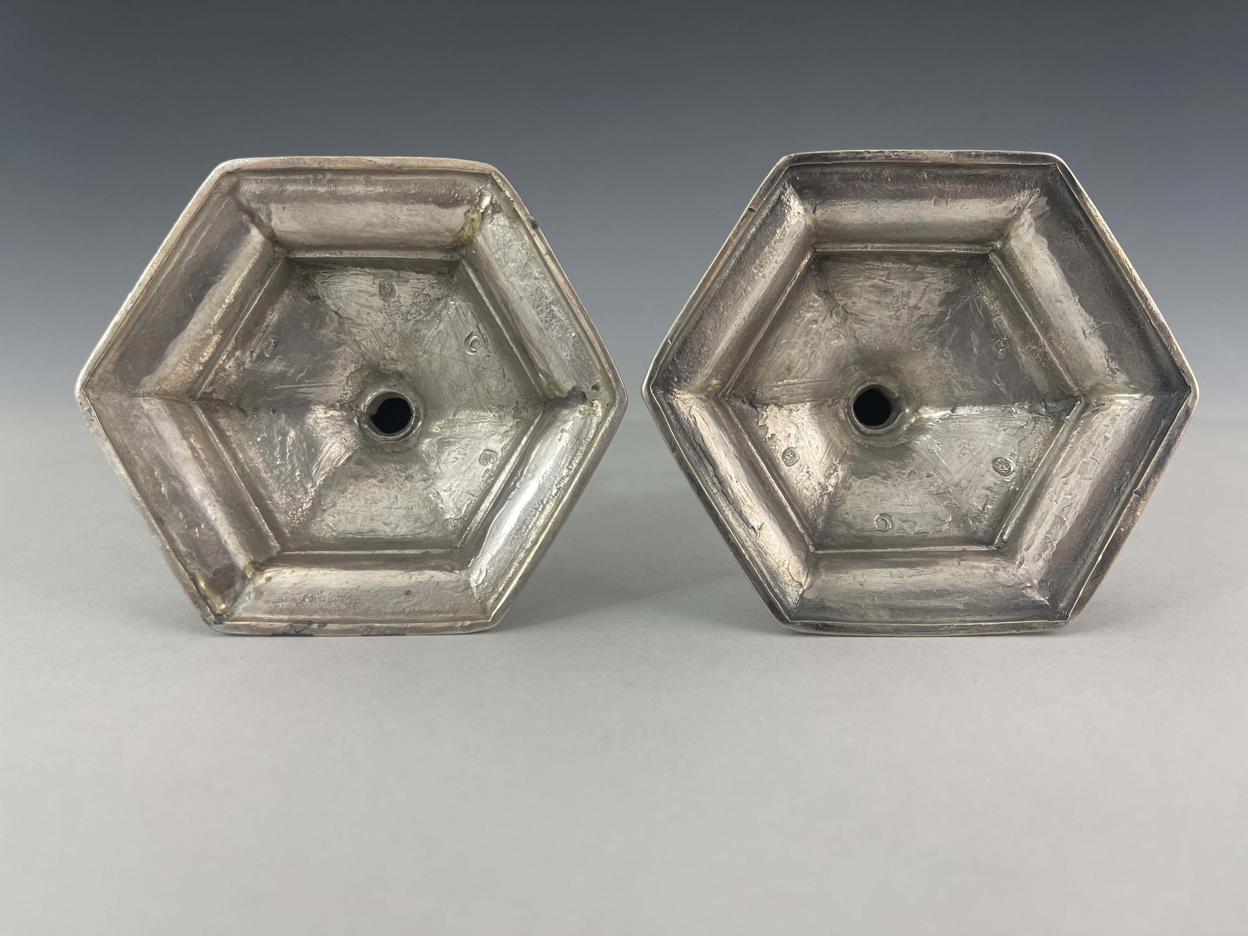 A pair of George I silver candlesticks, Matthew Cooper, London 1718, hexagonal form, on stepped - Image 4 of 6