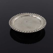 An 18th century miniature Dutch tazza, Amsterdam circa 1730, circular form with embossed beaded bord