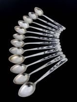 A set of 12 niello white metal spoons