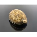 A George III silver mounted Cowrie shell snuff box