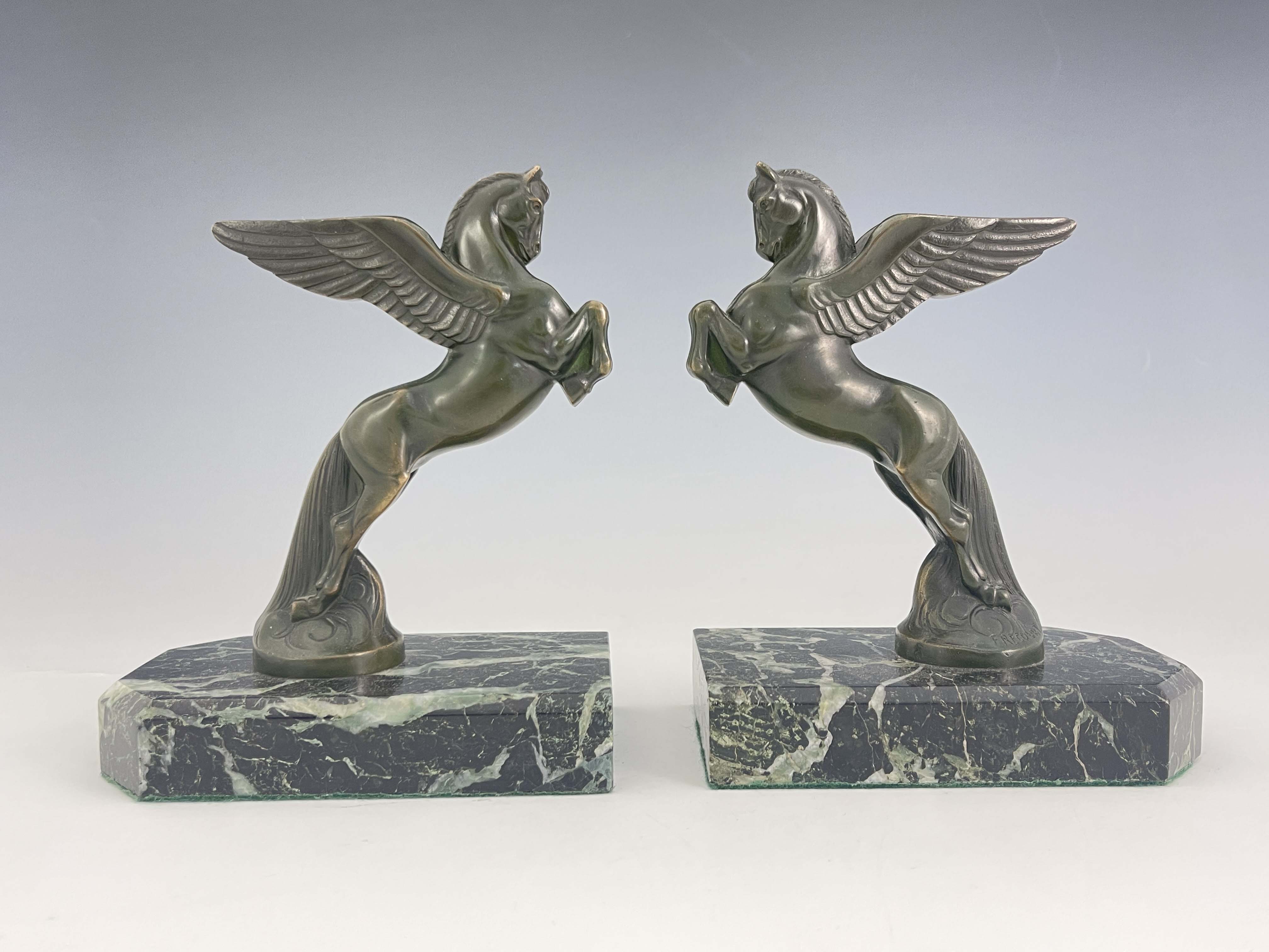 Maurice Frecourt, a pair of Art Deco bronze Pegasus bookends