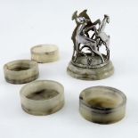 An Art Deco Austrian chrome and onyx coaster set, housed in stand with leaping deer on onyx