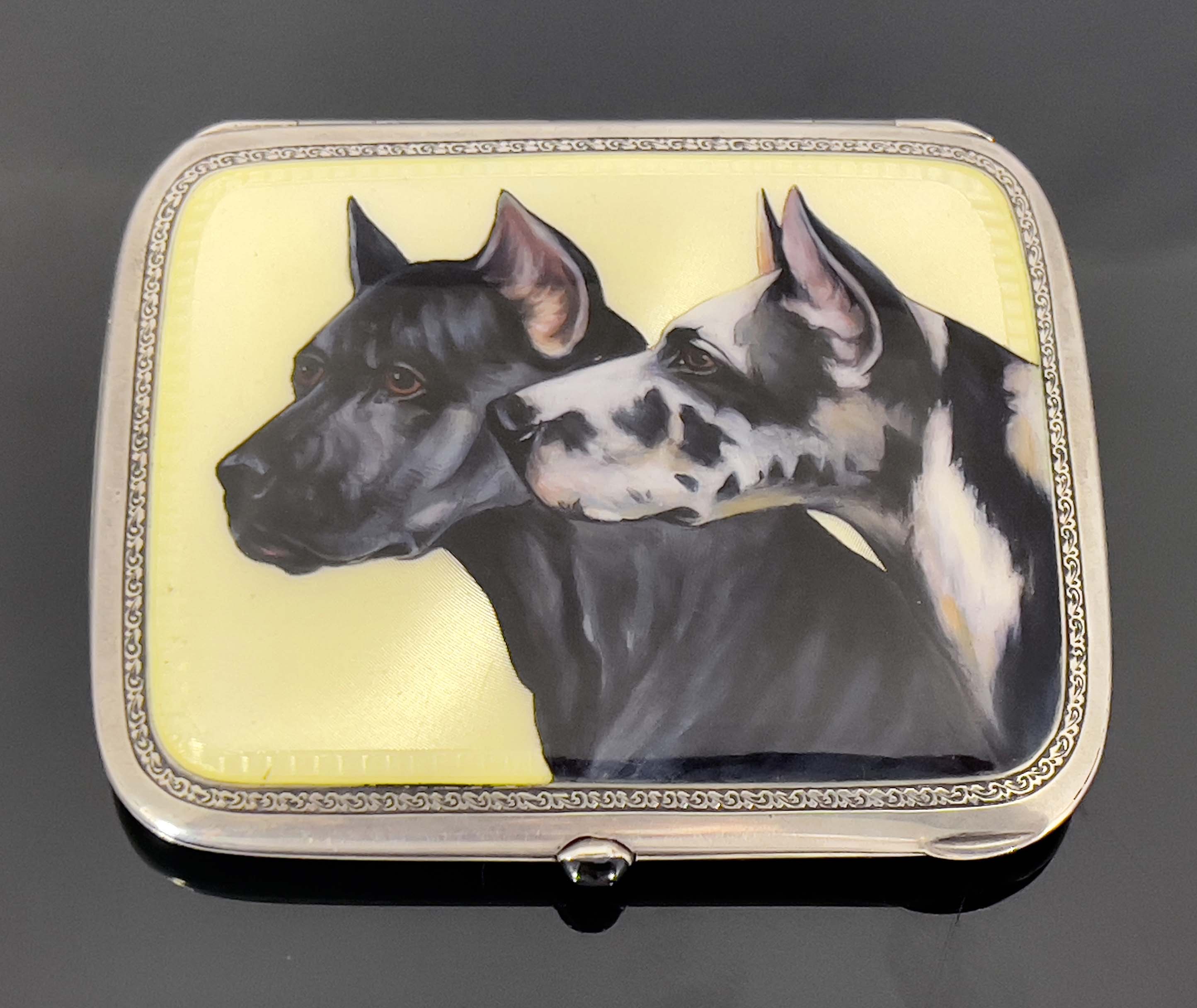 A silver and enamelled cigarette case