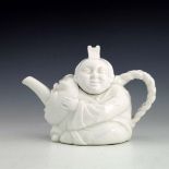 A Minton Aesthetic Movement Blanc de Chine Chinaman teapot