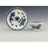 A Worcester blue and white relief moulded tea bowl and saucer