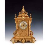 A French ormolu bracket clock, circa 1860, of architectural Baroque design, acanthus scroll and