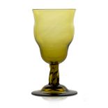 Philip Webb for James Powell and Sons, Whitefriars, an Arts and Crafts green glass wine glass