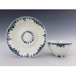 A Worcester blue and white reeded tea bowl and saucer