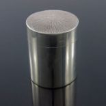 A Modernist silver tea caddy, Neil Lovesey, London 1972, cylindrical form with textured bark