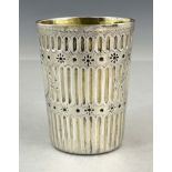 A Victorian silver beaker in a leathered case