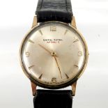 A 9 carat gold Smiths Astral wristwatch, on leather strap