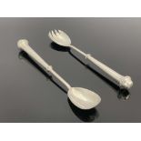 A pair of Arts and Crafts silver salad servers, William Hutton and Sons, London 1901