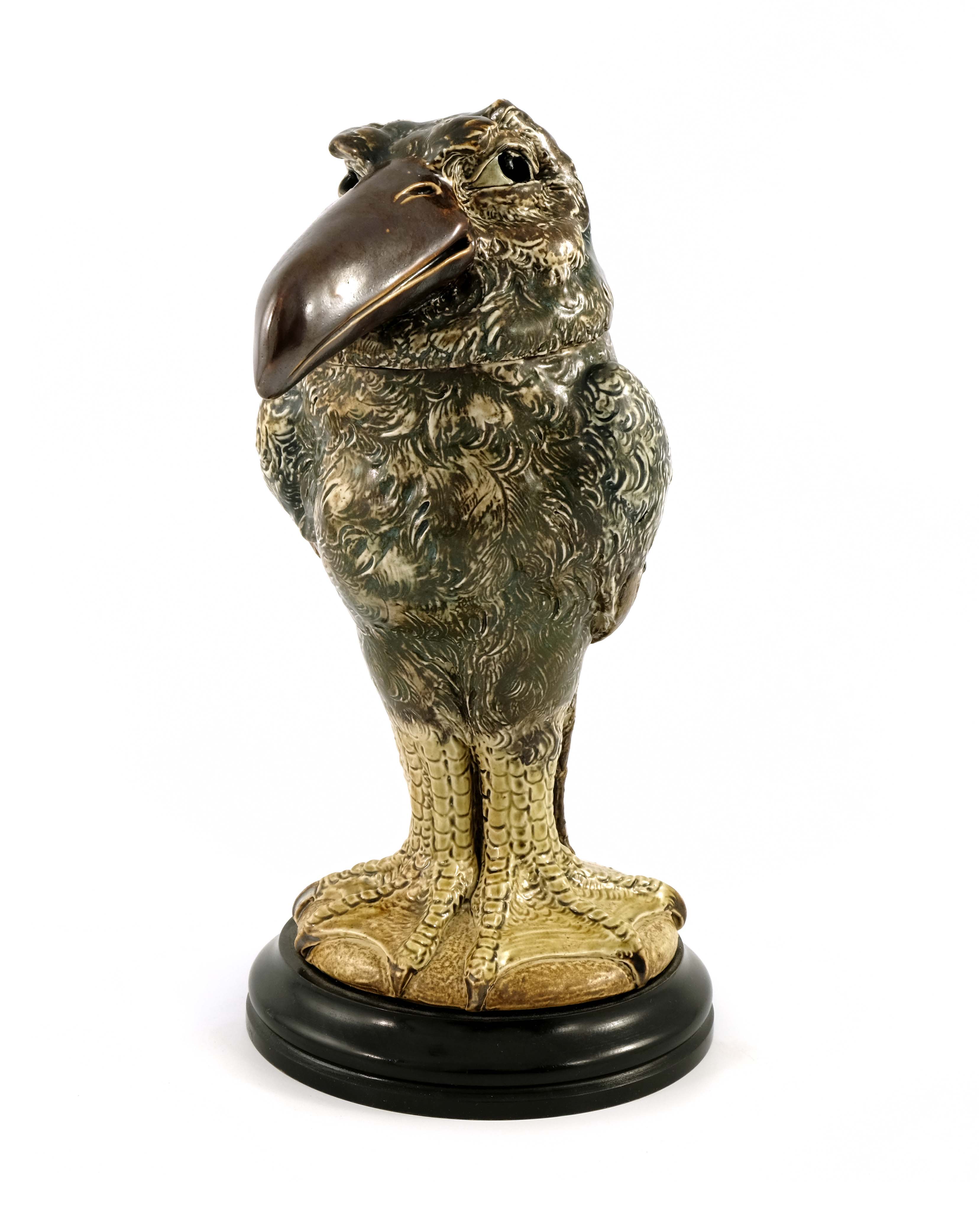 Robert Wallace Martin for Martin Brothers, a stoneware sculptural bird jar and cover