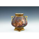 A late 19th Century Vienna twin handled vase, painted with a classical or mythological figure