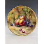 K M Price for Royal Worcester, a fruit painted plate, circa 1930s, decorated with plums, damsons and