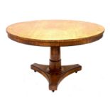 A George IV pollard oak breakfast table, circa 1825, circular crossbanded and ebony strung tilt top,